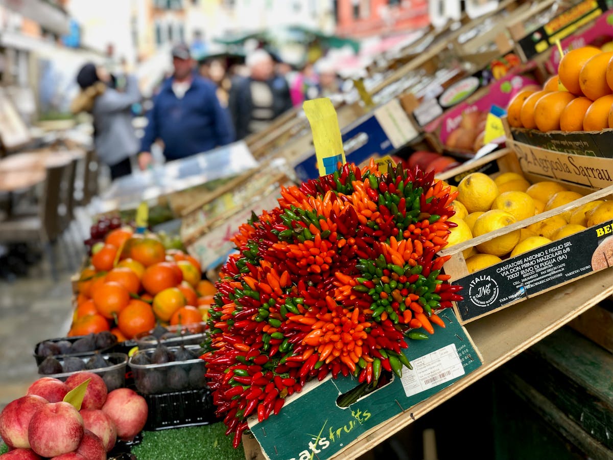 Colorful fresh produce displayed at a Venice market stall