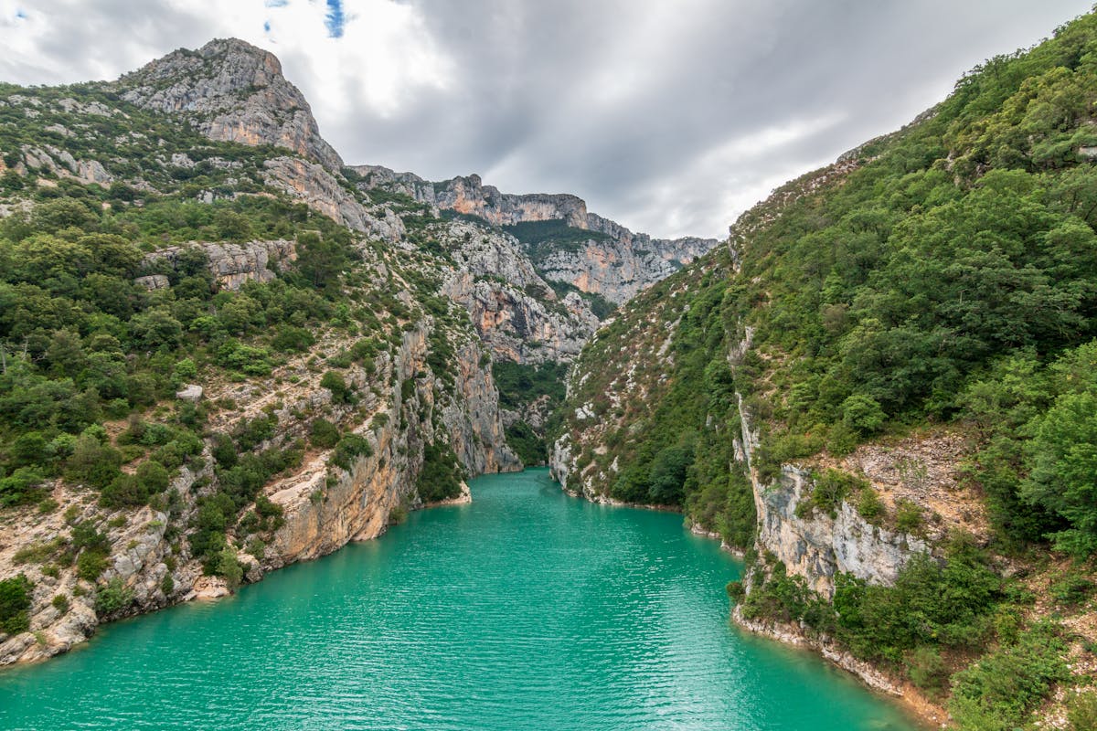 Turquoise river flowing through the deep limestone canyon of the Verdon Gorge in Provence France