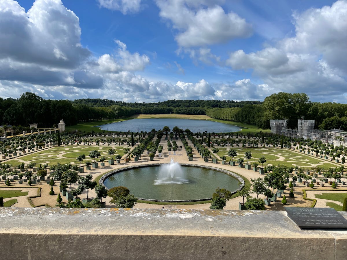 Aerial view of the formal gardens and fountain at the Palace of Versailles
