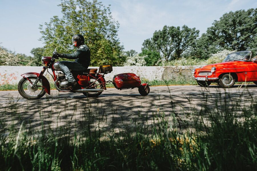 Vintage motorcycle with sidecar on a sunny country road