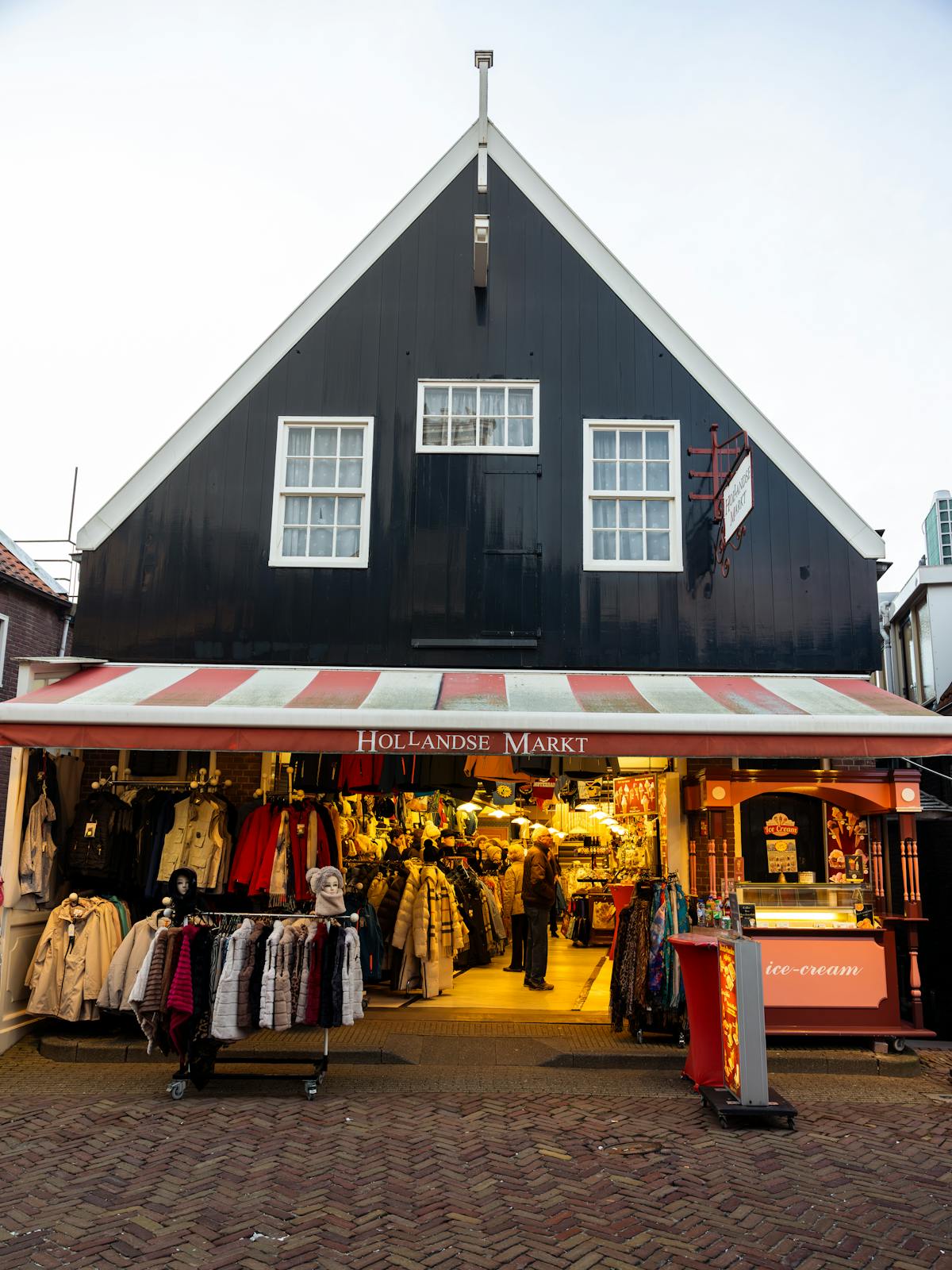Traditional outdoor market in Volendam with textiles and local goods