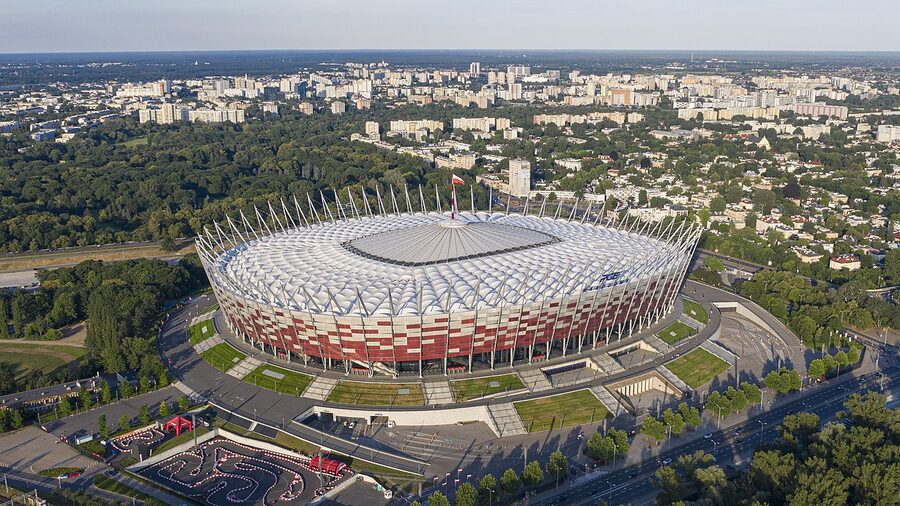 Aerial view of Warsaw National Stadium with white latticed exterior