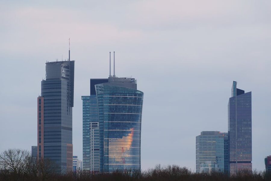 Modern Warsaw skyline at twilight with skyscrapers above the city