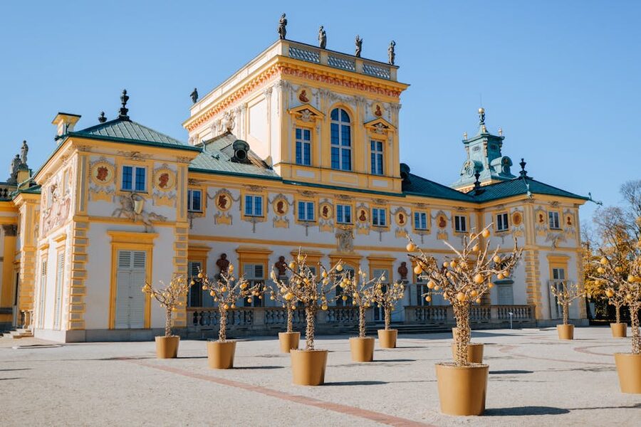 Wilanów Palace with formal baroque architecture under blue sky