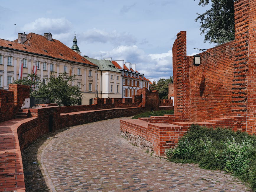 Warsaw Old Town red brick defensive walls and cobblestones