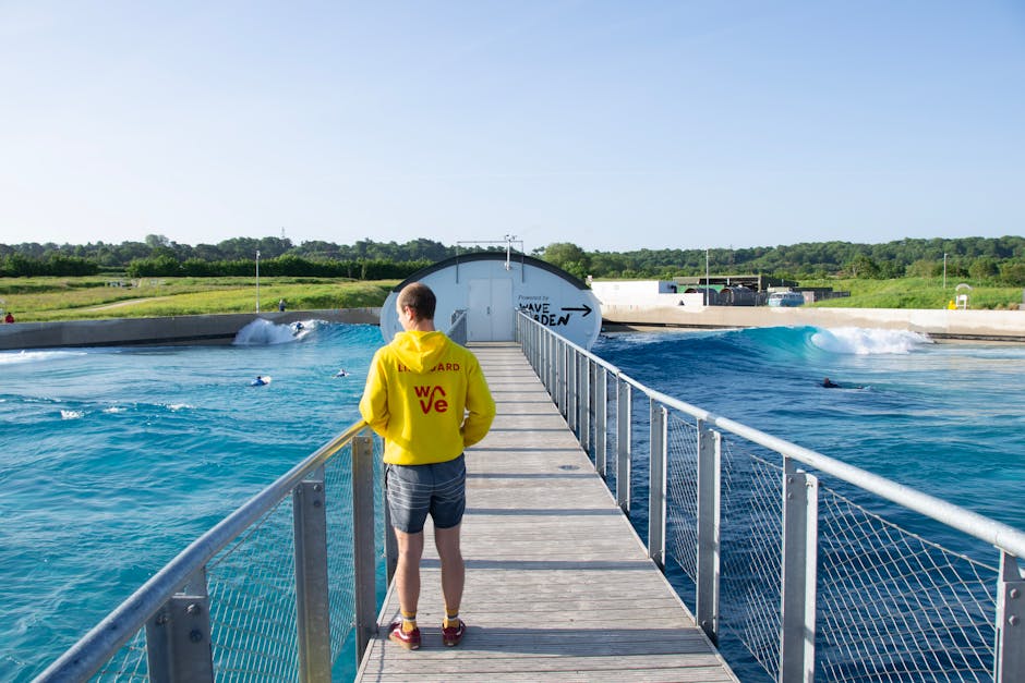 Swimmers enjoying a large wave pool with artificial waves