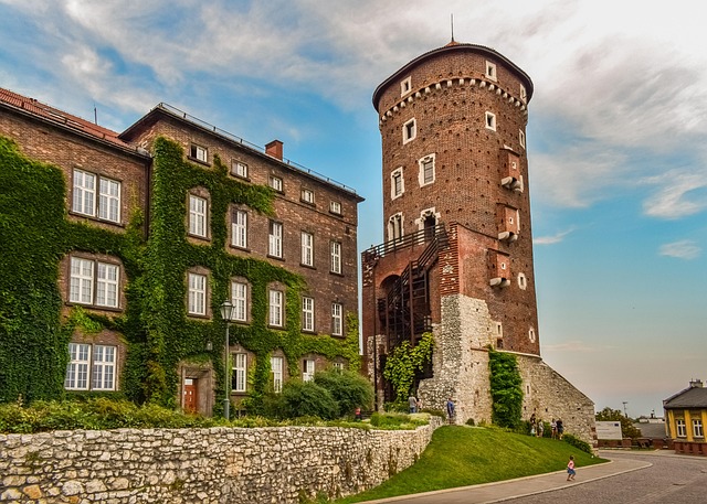 Side view of Wawel Castle showing stone walls and towers