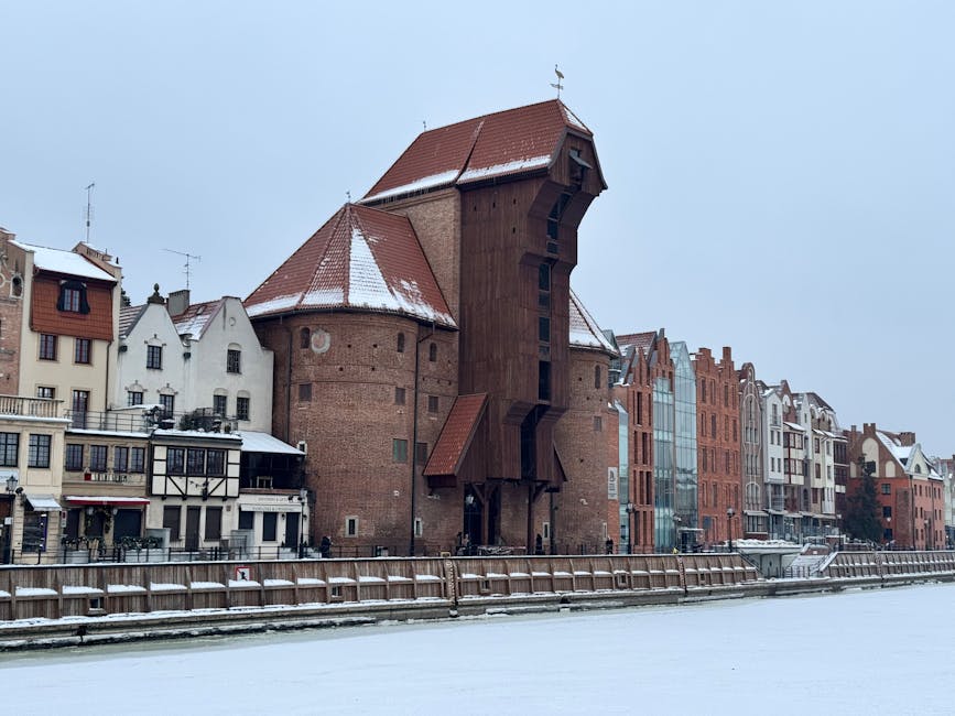 The Gdańsk Crane covered in snow on the Motława waterfront