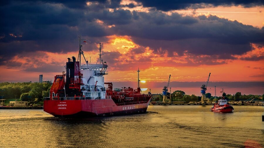 Gdańsk port cranes seen from the water on the way to Westerplatte