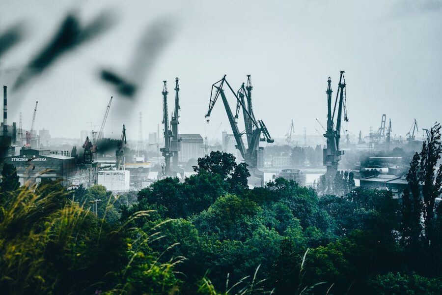Gdańsk shipyard in foggy morning light from the water
