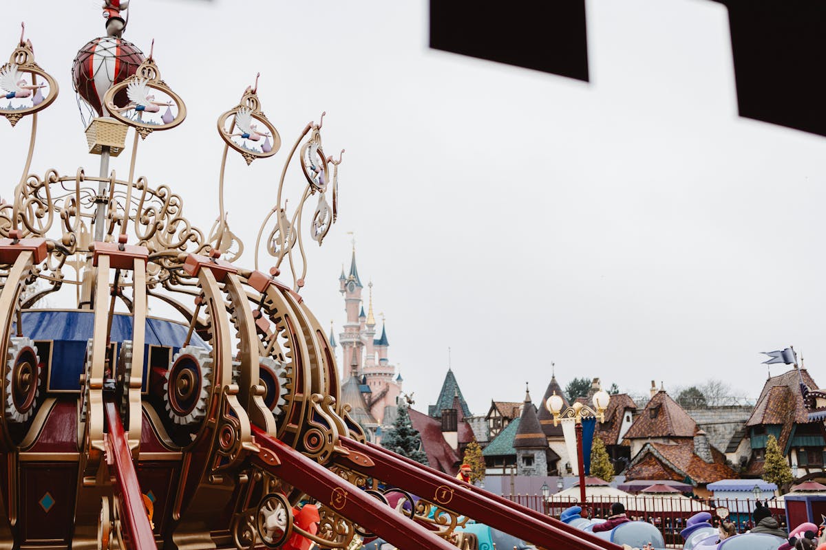 An ornate fairy tale themed ride with detailed architecture at Disneyland Paris
