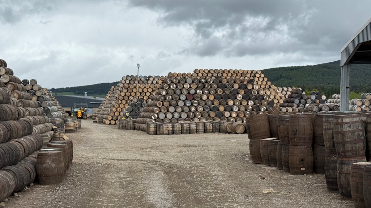 Whisky barrels stacked at a Scottish distillery