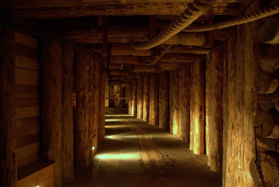 Wooden-beamed underground corridor in Wieliczka Salt Mine