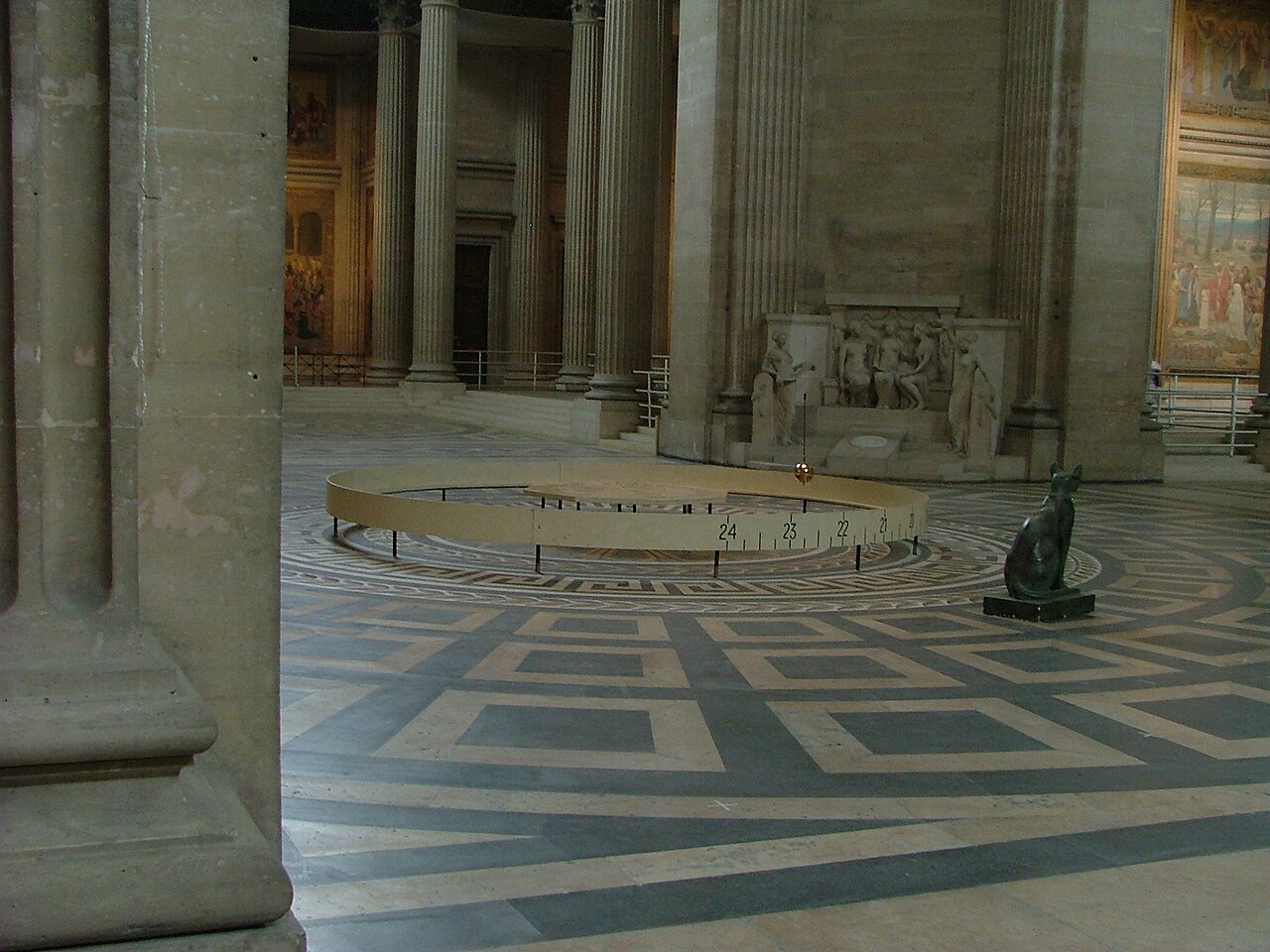 Foucault's Pendulum swinging inside the Pantheon in Paris