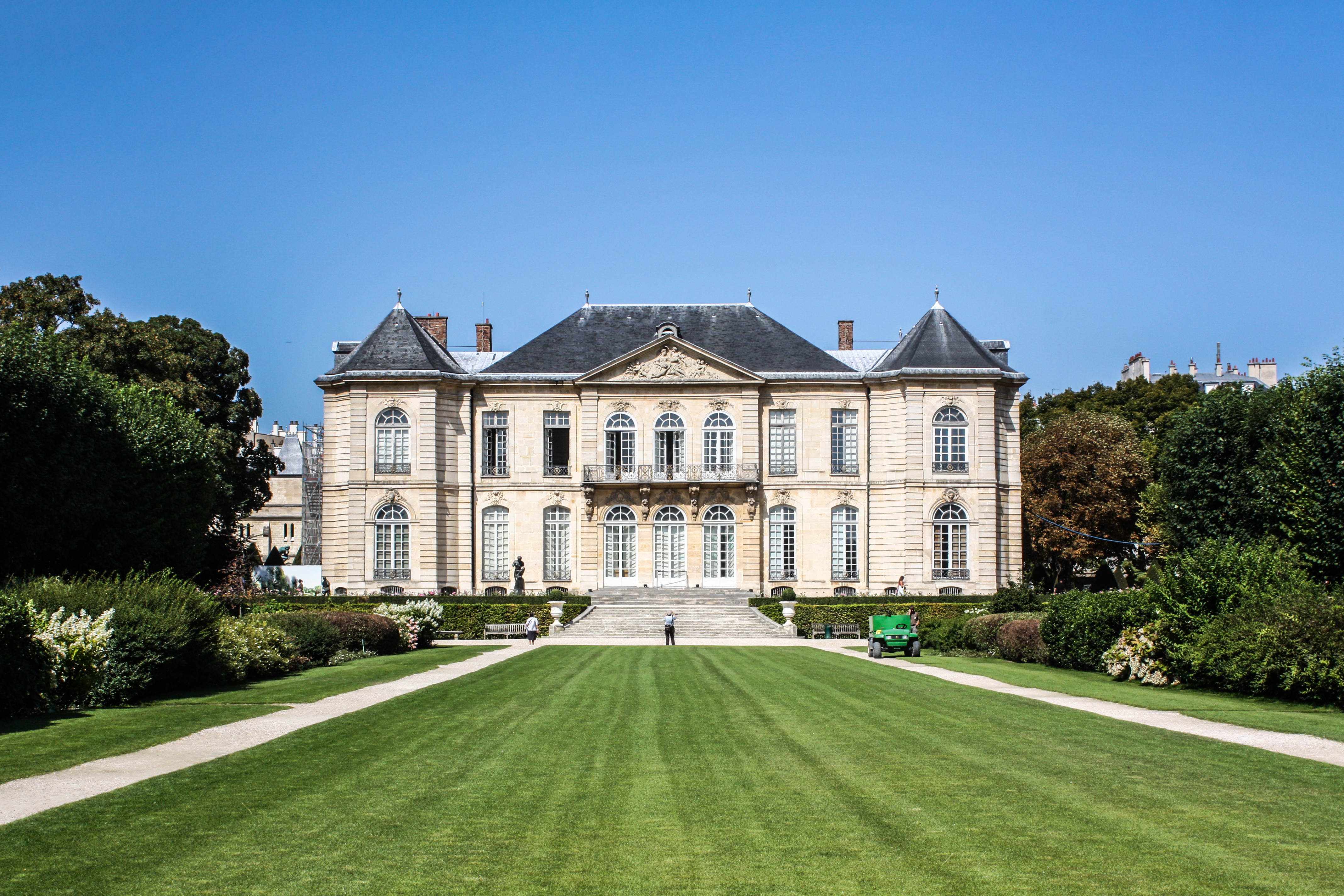 Musee Rodin sculpture garden with mature trees and walking paths in Paris