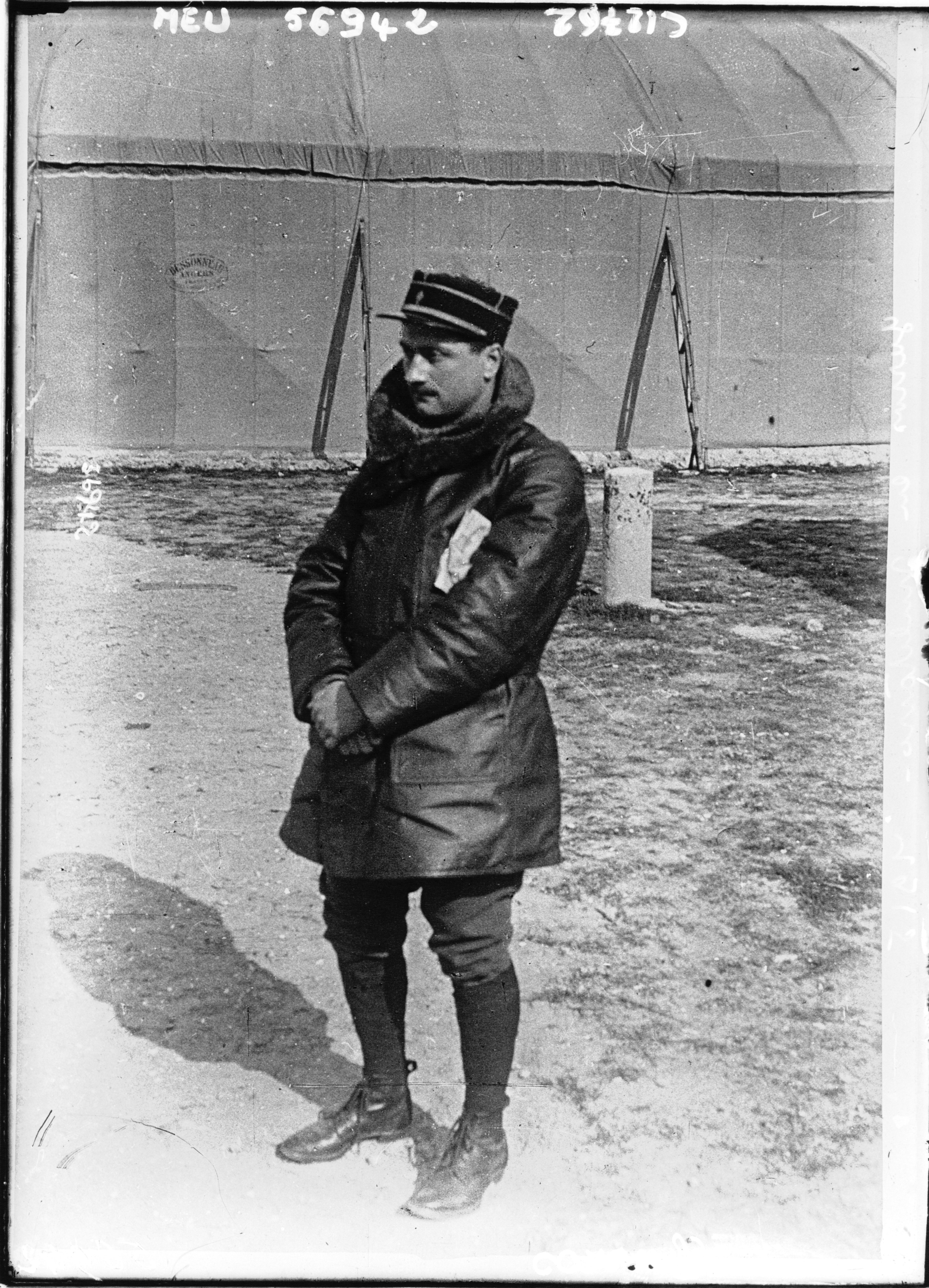 Black and white portrait photograph of Roland Garros in military aviation uniform
