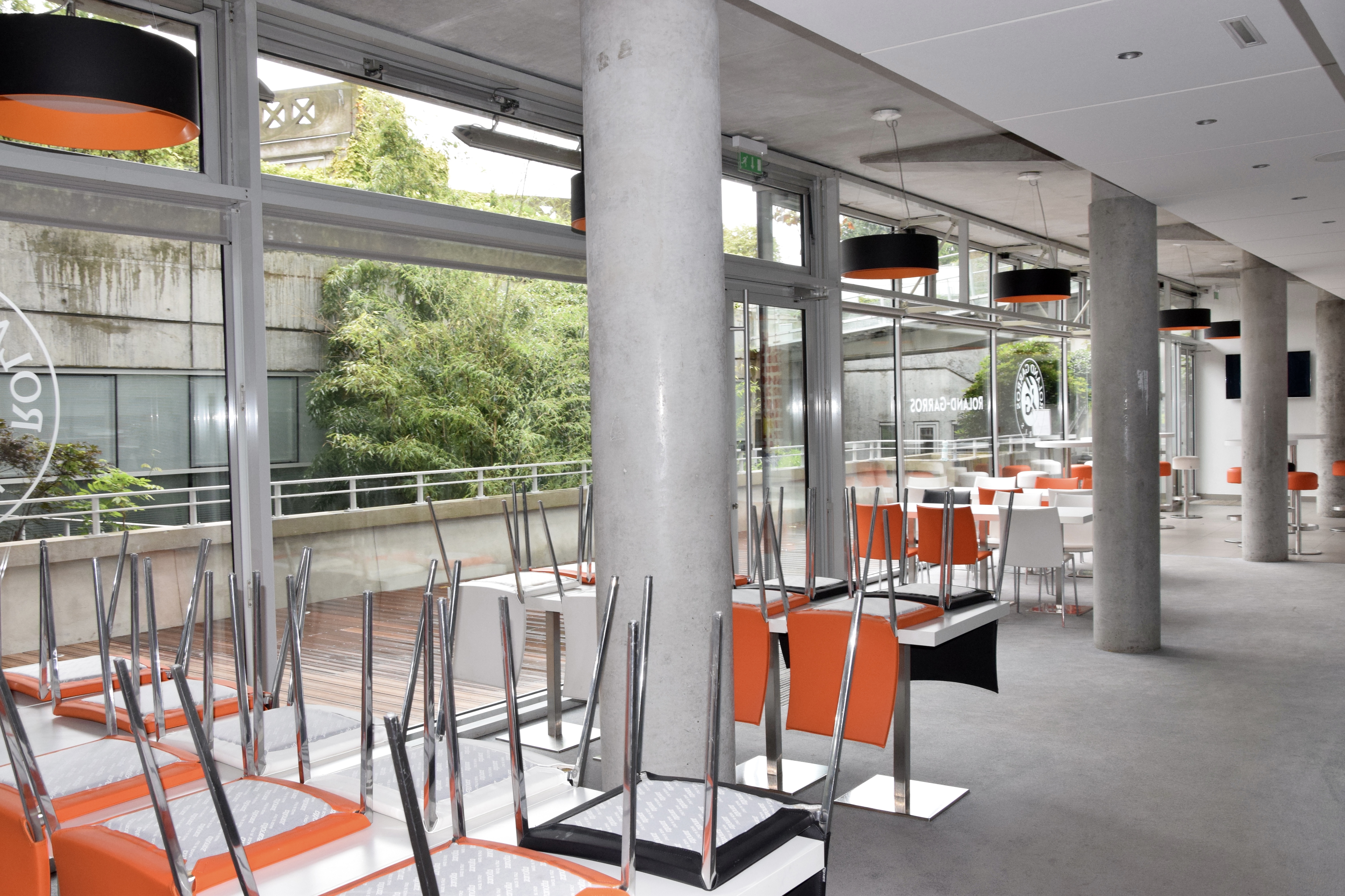 Architectural view of Roland Garros stadium interior showing seating and structure
