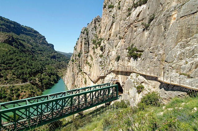 Cliff path along the Caminito del Rey with views of the gorge below and surrounding limestone formations