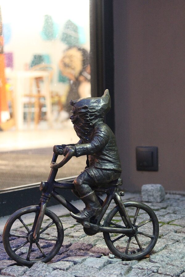 Cyclist dwarf on Swidnicka Street Wroclaw
