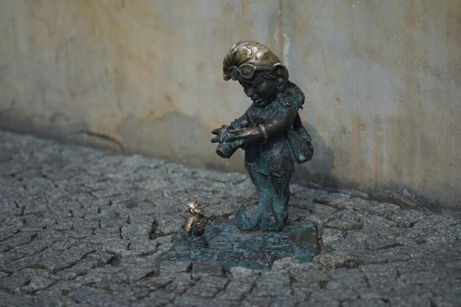 Wroclaw dwarf bronze figurine on the cobblestones