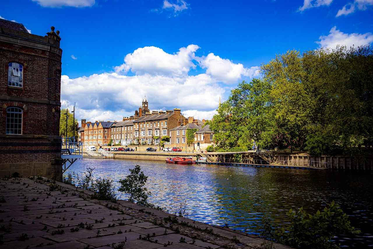 Historic bridge over the River Ouse in York with Gothic cathedral architecture visible beyond