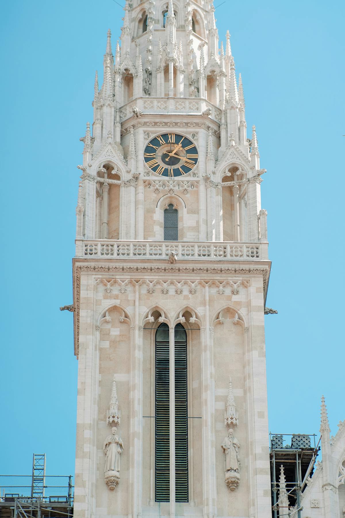 Gothic church tower in Zagreb with clock face