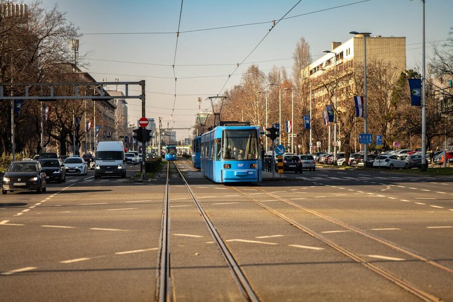 Zagreb blue tram in busy street