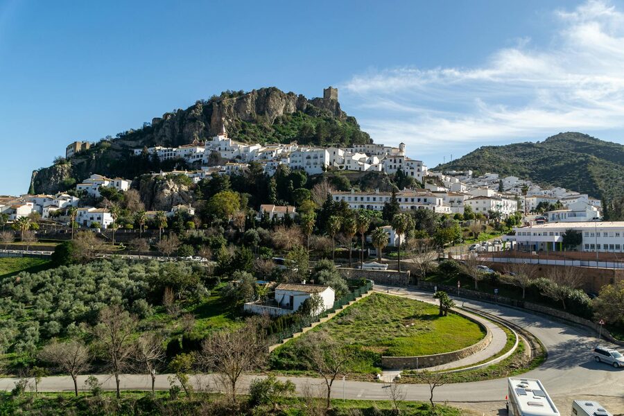 Aerial view of Zahara de la Sierra hillside homes and castle