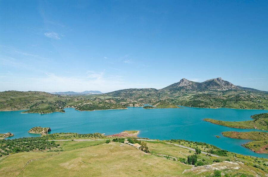 Zahara El Gastor reservoir with mountains and blue sky