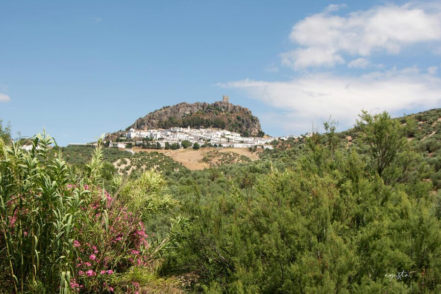 Zahara de la Sierra hilltop town surrounded by green hills