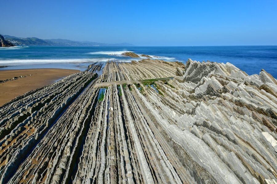 Aerial view of the dramatic flysch rock formations along the coast at Zumaia in Spain
