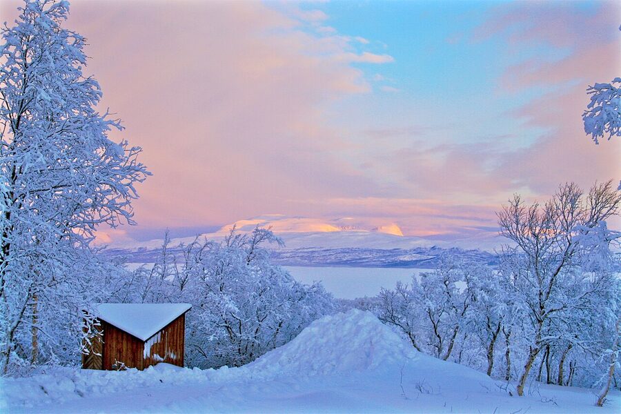 Frozen Lake Tornetrask in winter near Abisko