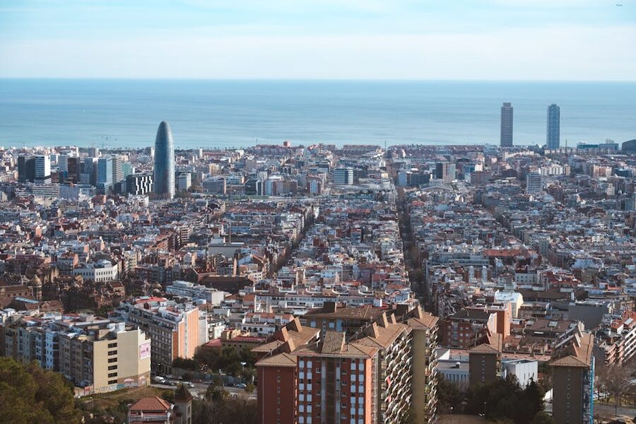 Barcelona aerial cityscape with Mediterranean Sea