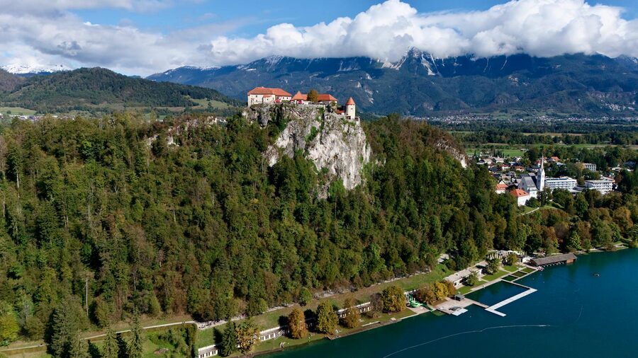 Aerial view of Bled Castle on a cliff above Lake Bled