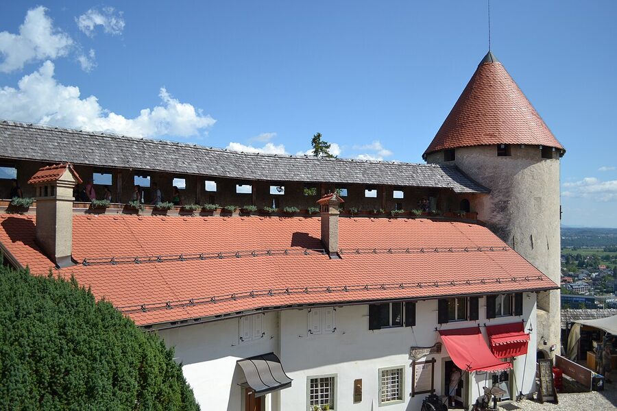 The lower courtyard of Bled Castle with stone buildings