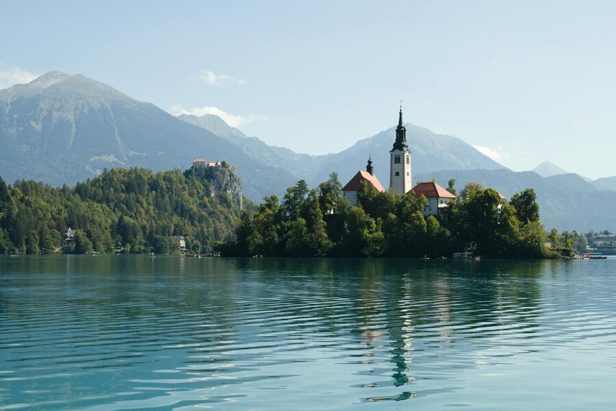 Bled Island with church and mountains on Lake Bled