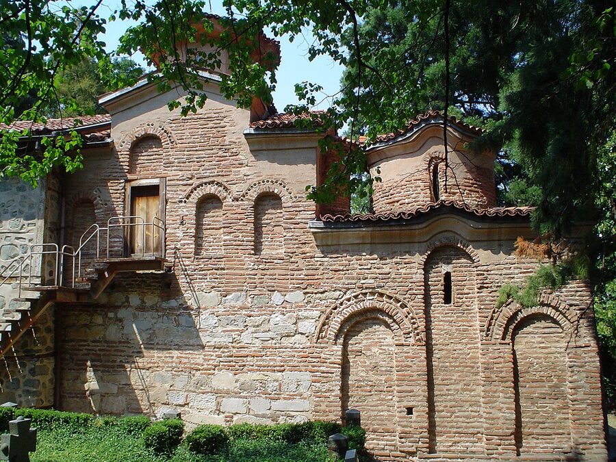 Side view of Boyana Church in its wooded Sofia park setting