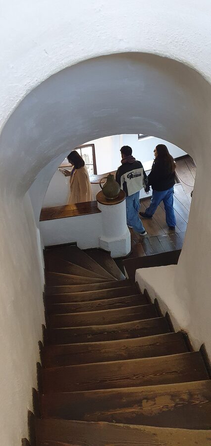 Bran Castle narrow wooden interior staircase