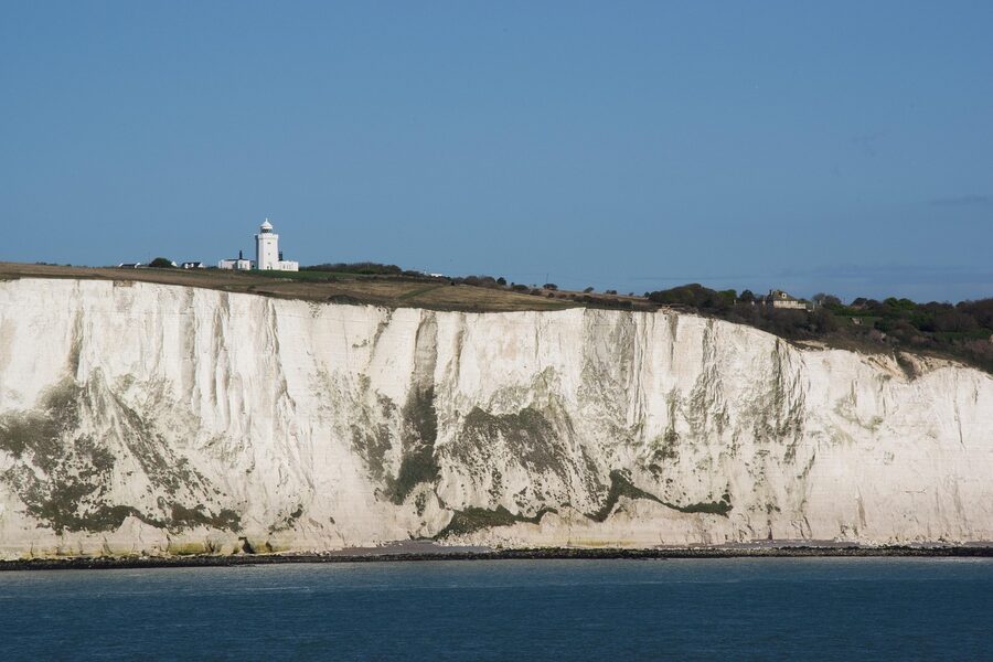 Dover coast with lighthouse and cliffs