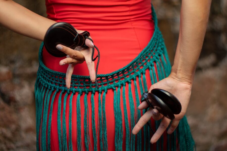 Castanets in a flamenco dancer's hands close-up