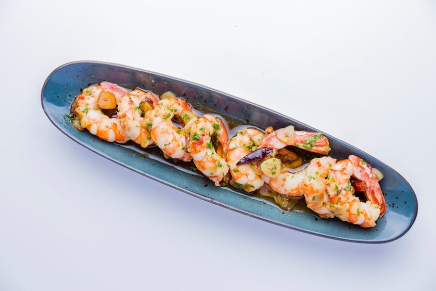 Gambas shrimp tapa on blue plate