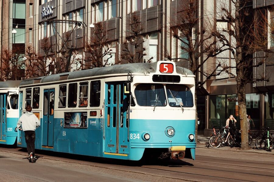 Blue tram in central Gothenburg street