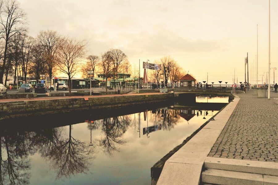 Tranquil Gothenburg canal with overhanging trees