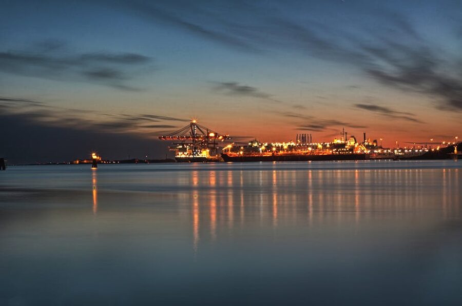 Gothenburg harbour cranes glowing at dusk
