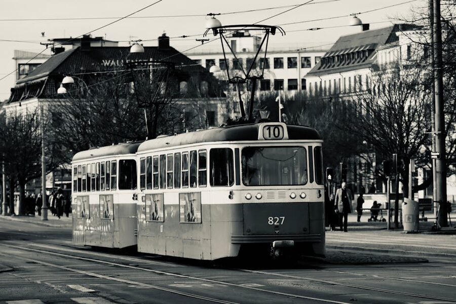 Gothenburg tram in black and white on a city street