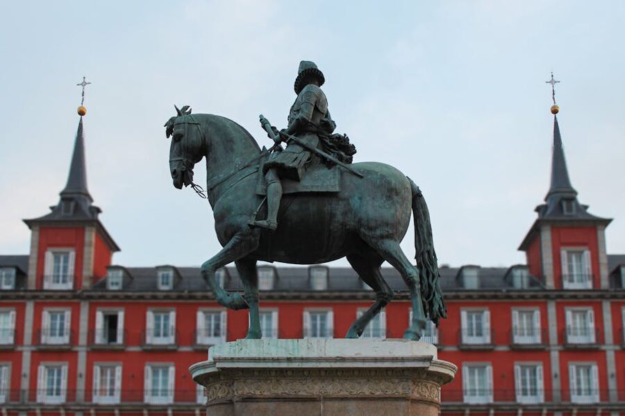 Plaza Mayor Madrid with Felipe III equestrian statue and Casa de la Panaderia