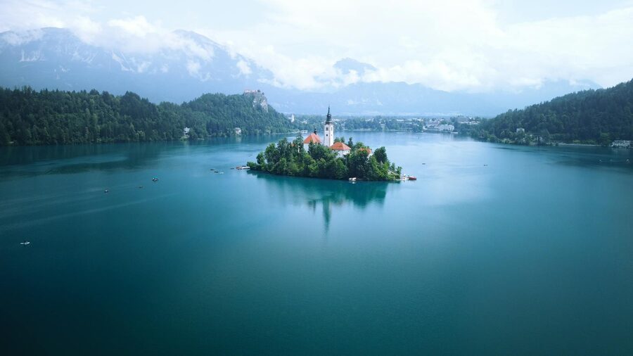 Aerial view of Bled Island and the Church of the Assumption on Lake Bled