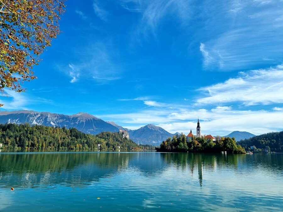 Lake Bled on a sunny summer day with the Julian Alps in the distance