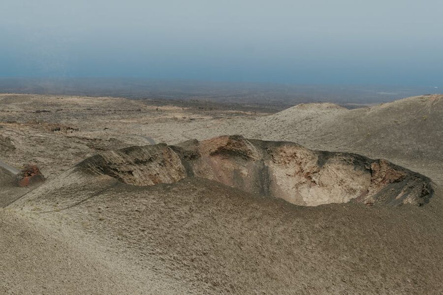Lanzarote volcanic crater under blue sky