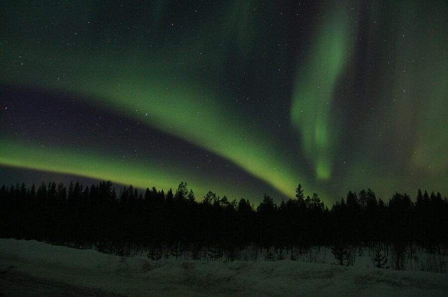 Northern lights filling the sky over Swedish Lapland